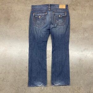 Dark wash True Religion distressed jeans